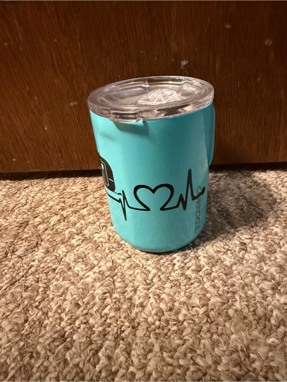 Corkcicle coffee tumbler with camper design.